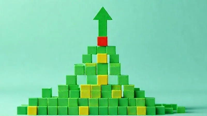 A photorealistic image showing a visual metaphor for a 'test pyramid' with numerous small green blocks at the base (unit tests), fewer medium-sized yellow blocks in the middle (integration tests), and a single large red block at the top (end-to-end tests), all flowing smoothly into a green arrow pointing upwards, symbolizing efficient testing. Professional photography, 8K, cinematic lighting, sharp focus, depth of field, shot on a high-end DSLR. A photorealistic image showing a visual metaphor for a 'test pyramid' with numerous small green blocks at the base (unit tests), fewer medium-sized yellow blocks in the middle (integration tests), and a single large red block at the top (end-to-end tests), all flowing smoothly into a green arrow pointing upwards, symbolizing efficient testing. Professional photography, 8K, cinematic lighting, sharp focus, depth of field, shot on a high-end DSLR.